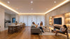 Modern home interior illuminated with energy-saving LED lights and smart lighting solutions
