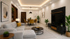 Modern living room with a cozy gray sectional sofa and yellow cushions. A sleek black TV stand and wall decor complement the warm lighting and indoor plants, creating a harmonious and inviting atmosphere.